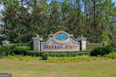 Discover your dream home nestled alongside the stunning 8th hole on The Club At Osprey Cove in Georgia - for sale on GolfHomes.com, golf home, golf lot