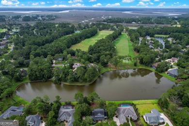 Discover your dream home nestled alongside the stunning 8th hole on The Club At Osprey Cove in Georgia - for sale on GolfHomes.com, golf home, golf lot