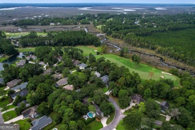 Discover your dream home nestled alongside the stunning 8th hole on The Club At Osprey Cove in Georgia - for sale on GolfHomes.com, golf home, golf lot