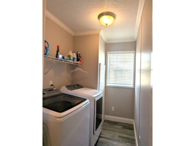 Listed by the Official Sales Team of Cypress Lakes Village on Big Cypress Golf and Country Club in Florida - for sale on GolfHomes.com, golf home, golf lot