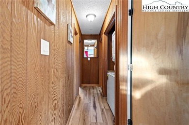 TURNKEY, SLOPESIDE condo overlooking Easy Street ski run and on Sugar Mountain Golf Course in North Carolina - for sale on GolfHomes.com, golf home, golf lot