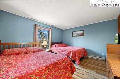 TURNKEY, SLOPESIDE condo overlooking Easy Street ski run and on Sugar Mountain Golf Course in North Carolina - for sale on GolfHomes.com, golf home, golf lot