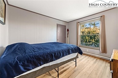 TURNKEY, SLOPESIDE condo overlooking Easy Street ski run and on Sugar Mountain Golf Course in North Carolina - for sale on GolfHomes.com, golf home, golf lot