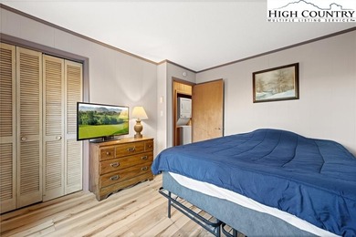 TURNKEY, SLOPESIDE condo overlooking Easy Street ski run and on Sugar Mountain Golf Course in North Carolina - for sale on GolfHomes.com, golf home, golf lot