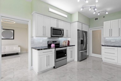 Stunning and spacious 3BD/2BA penthouse condo in the highly on Boca Pointe Country Club in Florida - for sale on GolfHomes.com, golf home, golf lot