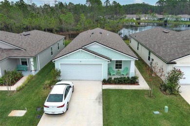 This MOVE- IN READY, LIKE NEW, WATERFRONT home, built in 2022 is on Grand Reserve Golf Course in Florida - for sale on GolfHomes.com, golf home, golf lot