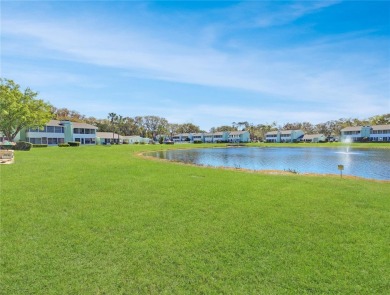 Charming 2nd Floor Furnished Condo in Live Oak Village - 55+ on Country Club At Silver Springs Shores in Florida - for sale on GolfHomes.com, golf home, golf lot