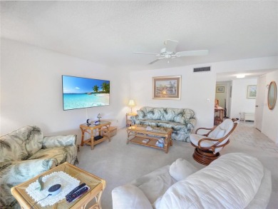 Charming 2nd Floor Furnished Condo in Live Oak Village - 55+ on Country Club At Silver Springs Shores in Florida - for sale on GolfHomes.com, golf home, golf lot