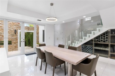 This elegant Spanish home filled with natural light, is situated on Granada Golf Club in Florida - for sale on GolfHomes.com, golf home, golf lot