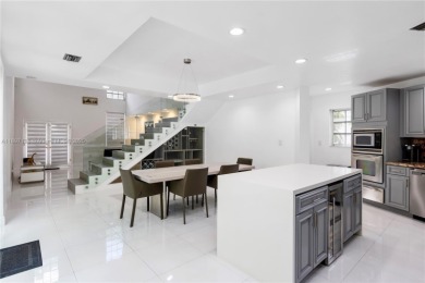 This elegant Spanish home filled with natural light, is situated on Granada Golf Club in Florida - for sale on GolfHomes.com, golf home, golf lot