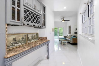This elegant Spanish home filled with natural light, is situated on Granada Golf Club in Florida - for sale on GolfHomes.com, golf home, golf lot