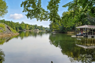 Your Lakefront Legacy Awaits! With its prime peninsula location on Tega Cay Golf Club in South Carolina - for sale on GolfHomes.com, golf home, golf lot