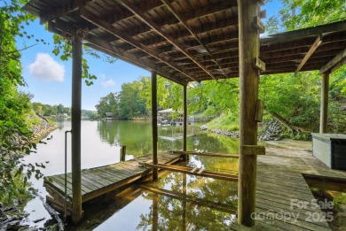 Your Lakefront Legacy Awaits! With its prime peninsula location on Tega Cay Golf Club in South Carolina - for sale on GolfHomes.com, golf home, golf lot