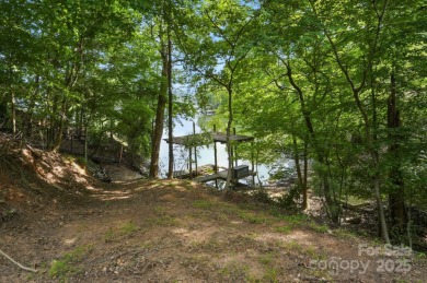 Your Lakefront Legacy Awaits! With its prime peninsula location on Tega Cay Golf Club in South Carolina - for sale on GolfHomes.com, golf home, golf lot