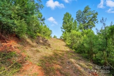 Your Lakefront Legacy Awaits! With its prime peninsula location on Tega Cay Golf Club in South Carolina - for sale on GolfHomes.com, golf home, golf lot