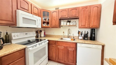 Beautiful and spacious 2BD/1.5BA condo in the highly desirable on Flamingo Lakes Country Club in Florida - for sale on GolfHomes.com, golf home, golf lot