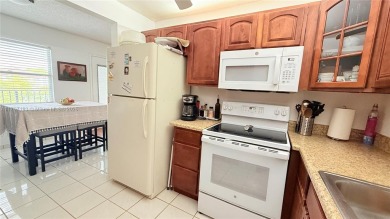Beautiful and spacious 2BD/1.5BA condo in the highly desirable on Flamingo Lakes Country Club in Florida - for sale on GolfHomes.com, golf home, golf lot
