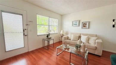 Beautiful and spacious 2BD/1.5BA condo in the highly desirable on Flamingo Lakes Country Club in Florida - for sale on GolfHomes.com, golf home, golf lot