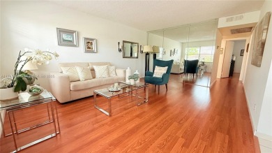 Beautiful and spacious 2BD/1.5BA condo in the highly desirable on Flamingo Lakes Country Club in Florida - for sale on GolfHomes.com, golf home, golf lot