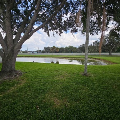 MOVE RIGHT INTO THIS BEAUTIFUL HOME WITH LVP THRU OUT, TRAY on Golden Lakes Golf Course in Florida - for sale on GolfHomes.com, golf home, golf lot