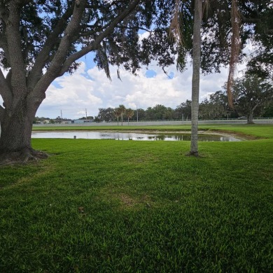 MOVE RIGHT INTO THIS BEAUTIFUL HOME WITH LVP THRU OUT, TRAY on Golden Lakes Golf Course in Florida - for sale on GolfHomes.com, golf home, golf lot