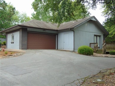 Welcome to this charming 2-bedroom, 2-bath home with a 2-car on Bella Vista - Metfield Golf Complex and Country Club in Arkansas - for sale on GolfHomes.com, golf home, golf lot