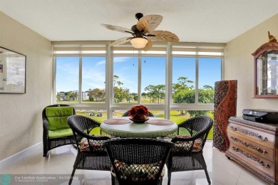 TOP FLOOR PENTHOUSE WITH A PANORAMIC LAKE & GOLF VIEW.  LONG on Oriole Golf and Tennis Club in Florida - for sale on GolfHomes.com, golf home, golf lot