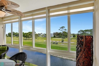 TOP FLOOR PENTHOUSE WITH A PANORAMIC LAKE & GOLF VIEW.  LONG on Oriole Golf and Tennis Club in Florida - for sale on GolfHomes.com, golf home, golf lot