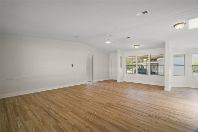 One or more photo(s) has been virtually staged. Step into this on Zellwood Station Country Club in Florida - for sale on GolfHomes.com, golf home, golf lot