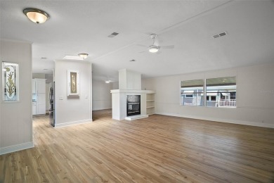 One or more photo(s) has been virtually staged. Step into this on Zellwood Station Country Club in Florida - for sale on GolfHomes.com, golf home, golf lot