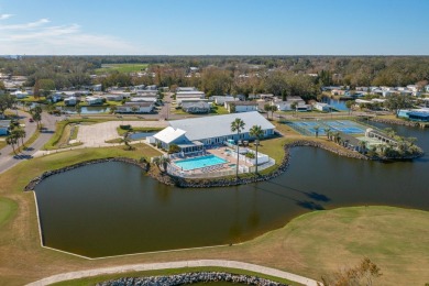 MOVE RIGHT INTO THIS BEAUTIFUL HOME WITH LVP THRU OUT, TRAY on Golden Lakes Golf Course in Florida - for sale on GolfHomes.com, golf home, golf lot