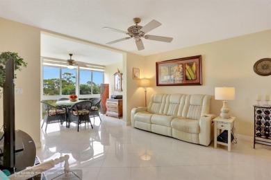 TOP FLOOR PENTHOUSE WITH A PANORAMIC LAKE & GOLF VIEW.  LONG on Oriole Golf and Tennis Club in Florida - for sale on GolfHomes.com, golf home, golf lot