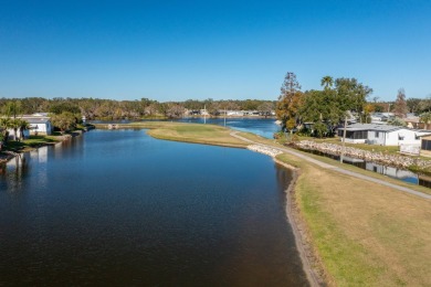 MOVE RIGHT INTO THIS BEAUTIFUL HOME WITH LVP THRU OUT, TRAY on Golden Lakes Golf Course in Florida - for sale on GolfHomes.com, golf home, golf lot