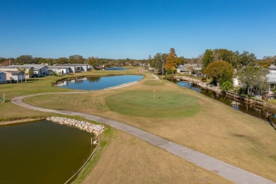 MOVE RIGHT INTO THIS BEAUTIFUL HOME WITH LVP THRU OUT, TRAY on Golden Lakes Golf Course in Florida - for sale on GolfHomes.com, golf home, golf lot