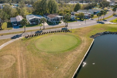 MOVE RIGHT INTO THIS BEAUTIFUL HOME WITH LVP THRU OUT, TRAY on Golden Lakes Golf Course in Florida - for sale on GolfHomes.com, golf home, golf lot