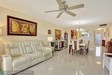 TOP FLOOR PENTHOUSE WITH A PANORAMIC LAKE & GOLF VIEW.  LONG on Oriole Golf and Tennis Club in Florida - for sale on GolfHomes.com, golf home, golf lot