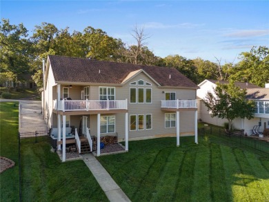 This 4-bedroom, 3-bathroom lake front Atrium Ranch home boasts on Raintree Country Club in Missouri - for sale on GolfHomes.com, golf home, golf lot