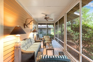 Southern coastal design and decor define this lakefront cottage on Sandestin Golf and Beach Resort - Raven in Florida - for sale on GolfHomes.com, golf home, golf lot