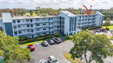 TOP FLOOR PENTHOUSE WITH A PANORAMIC LAKE & GOLF VIEW.  LONG on Oriole Golf and Tennis Club in Florida - for sale on GolfHomes.com, golf home, golf lot