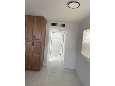 Experience luxurious living in this beautifully remodeled on Kings Point Golf - Executive in Florida - for sale on GolfHomes.com, golf home, golf lot