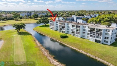 TOP FLOOR PENTHOUSE WITH A PANORAMIC LAKE & GOLF VIEW.  LONG on Oriole Golf and Tennis Club in Florida - for sale on GolfHomes.com, golf home, golf lot