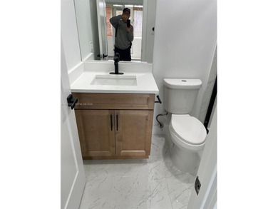 Experience luxurious living in this beautifully remodeled on Kings Point Golf - Executive in Florida - for sale on GolfHomes.com, golf home, golf lot