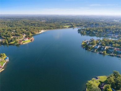 This 4-bedroom, 3-bathroom lake front Atrium Ranch home boasts on Raintree Country Club in Missouri - for sale on GolfHomes.com, golf home, golf lot