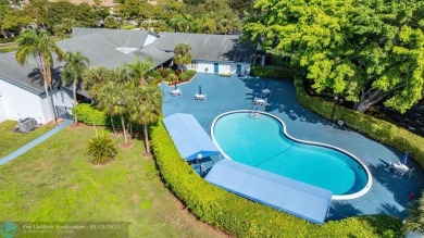 TOP FLOOR PENTHOUSE WITH A PANORAMIC LAKE & GOLF VIEW.  LONG on Oriole Golf and Tennis Club in Florida - for sale on GolfHomes.com, golf home, golf lot