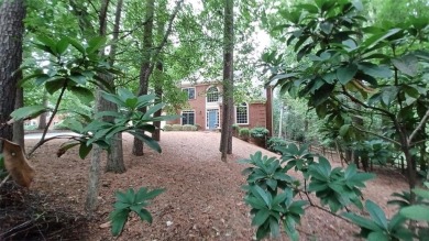 Enjoy the lifestyle provided by the exclusive North Fulton Lake on The Golf Club of Georgia in Georgia - for sale on GolfHomes.com, golf home, golf lot