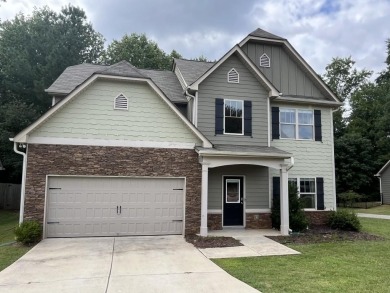 Gorgeous open concept family home with a massive kitchen perfect on Mirror Lake Golf Club in Georgia - for sale on GolfHomes.com, golf home, golf lot