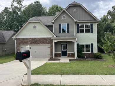 Gorgeous open concept family home with a massive kitchen perfect on Mirror Lake Golf Club in Georgia - for sale on GolfHomes.com, golf home, golf lot