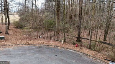Build your dream home on this exceptional lot nestled within one on Double Oaks Golf Club in Georgia - for sale on GolfHomes.com, golf home, golf lot