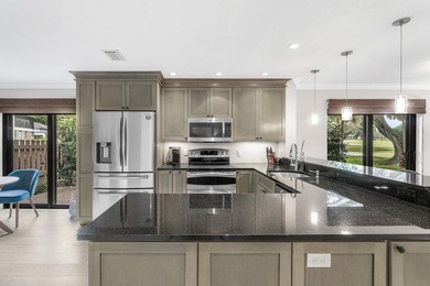 COMPLETELY RENOVATED 1ST-FLOOR CORNER 2br/2bth condo in a lush on Hunters Run Golf and Country Club in Florida - for sale on GolfHomes.com, golf home, golf lot