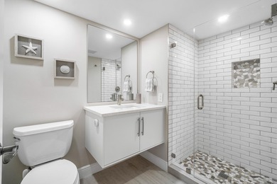 COMPLETELY RENOVATED 1ST-FLOOR CORNER 2br/2bth condo in a lush on Delray Dunes Golf and Country Club in Florida - for sale on GolfHomes.com, golf home, golf lot